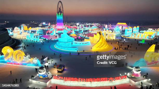 Aerial view of people visiting Harbin Ice and Snow World during the opening ceremony of the 39th Harbin International Ice and Snow Festival on...
