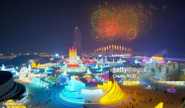 Fireworks light up the night sky over Harbin Ice and Snow World during the opening ceremony of the 39th Harbin International Ice and Snow Festival on...
