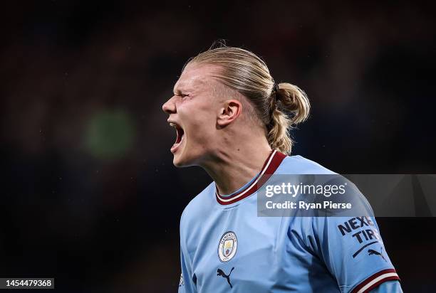 Erling Haaland of Manchester City celebrates their side's win during the Premier League match between Chelsea FC and Manchester City at Stamford...