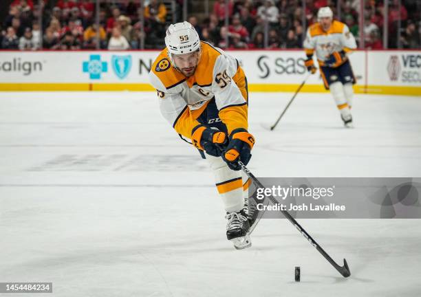 Roman Josi of the Nashville Predators skates during the first period against the Carolina Hurricanes at PNC Arena on January 05, 2023 in Raleigh,...