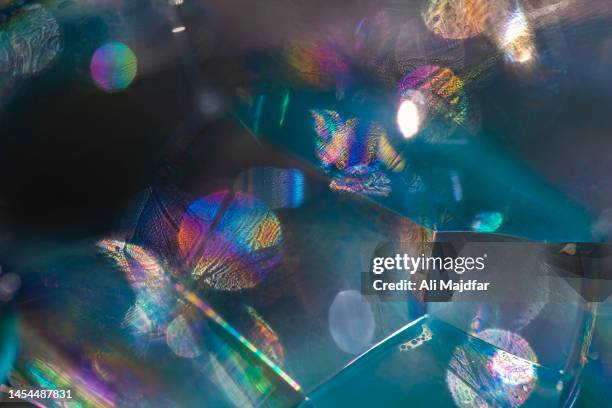 soap bubbles under light - blue sapphire stock pictures, royalty-free photos & images