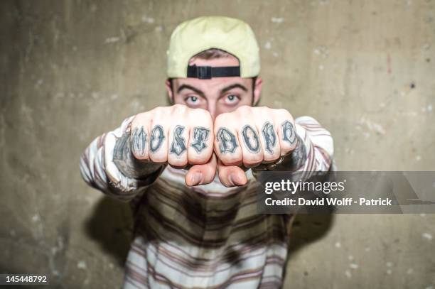 Mac Miller poses during photo session backstage at Casino de Paris on May 30, 2012 in Paris, France.
