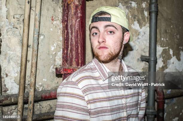 Mac Miller poses during photo session backstage at Casino de Paris on May 30, 2012 in Paris, France.