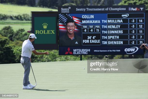 Collin Morikawa of the United States reacts to a missed putt for birdie on the 18th green during the first round of the Sentry Tournament of...