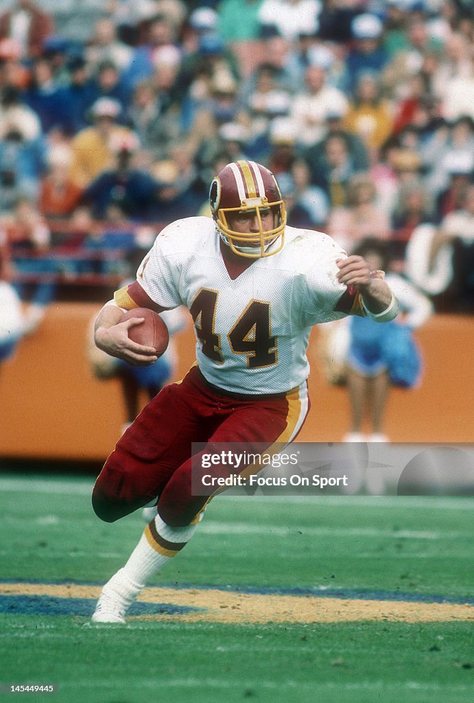 44 Redskins John Riggins Running back John Riggins of the Washington Redskins carries the ball ...