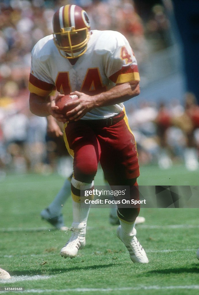 44 Redskins John Riggins Running back John Riggins of the Washington Redskins carries the ball ...