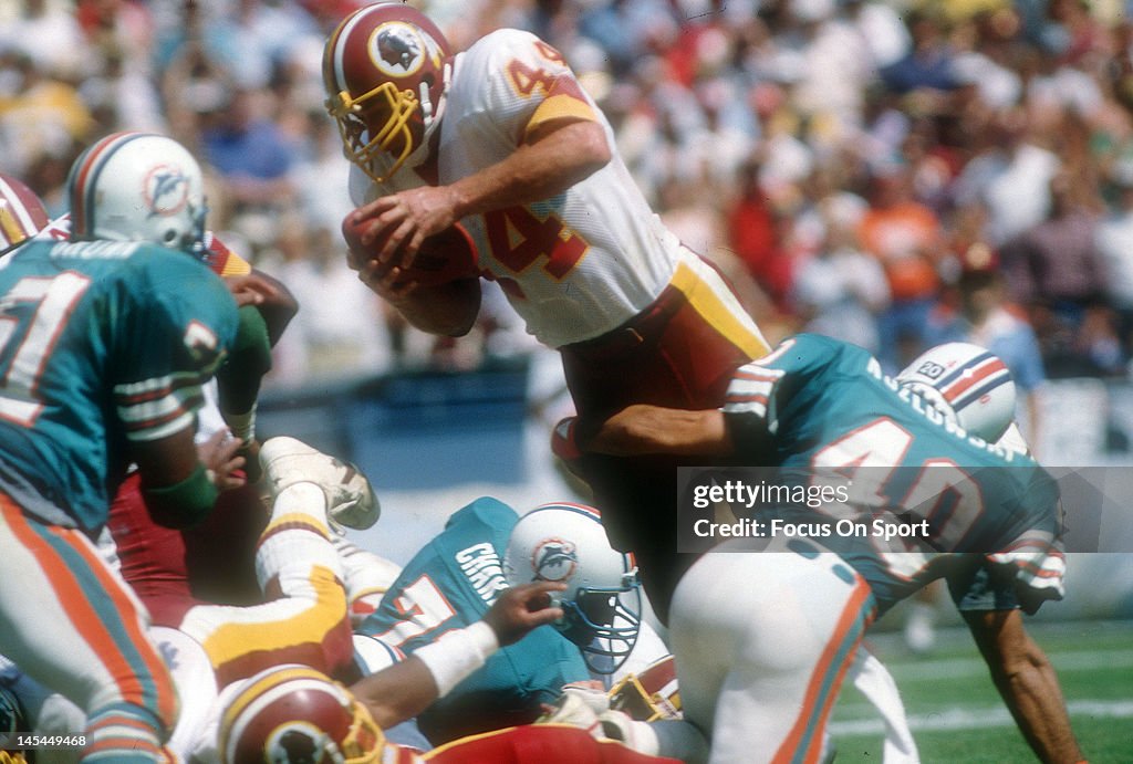 44 Redskins John Riggins Running back John Riggins of the Washington Redskins dives for the ...