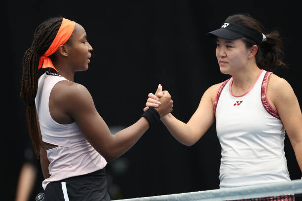 Coco Gauff of the USA and Lin Zhu of China shake hands following their quarter final match on day five of the 2023 ASB Classic Women's at the ASB...