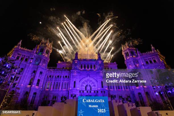 Fireworks are seen during the Three Kings Parade in Madrid on January 05, 2023 in Madrid, Spain.