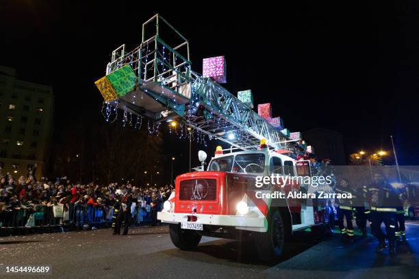 Firefighters attend the Three Kings Parade in Madrid on January 05, 2023 in Madrid, Spain.