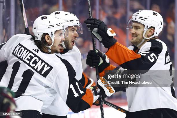Travis Konecny and Tony DeAngelo of the Philadelphia Flyers celebrate a goal scored during the second period against the Arizona Coyotes at Wells...