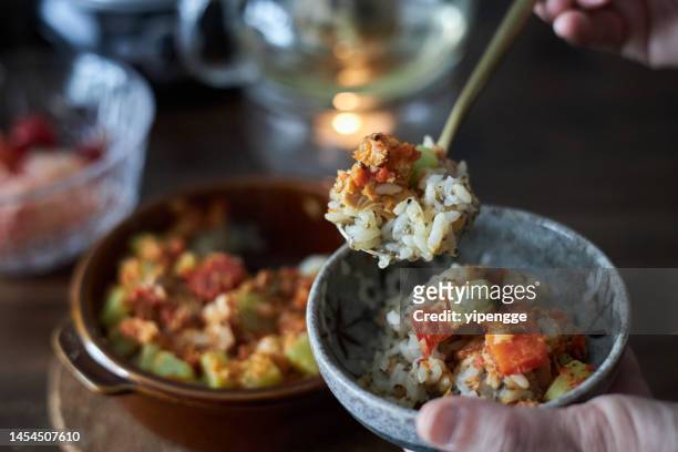delicious and healthy quinoa rice risotto - macrobiotic diet stock pictures, royalty-free photos & images
