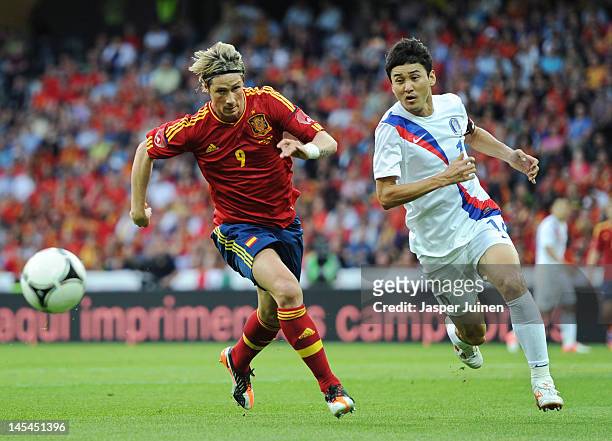 Fernando Torres of Spain runs for the ball with Jung Soo Lee of Korea Republic during the international friendly match between Spain and Korea...