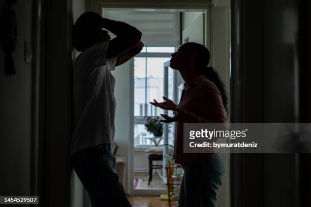 stressed couple arguing, blaming each other - fighting imagens e fotografias de stock