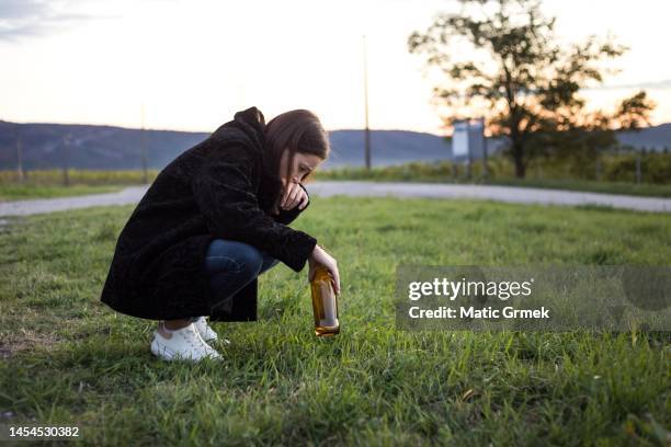 drunk alcoholic young girl feeling sick by drinking beer. - punching glass stock pictures, royalty-free photos & images