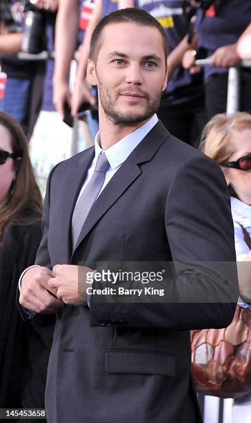 Actor Taylor Kitsch arrives at the Los Angeles premiere of "Battleship" at the Nokia Theatre L.A. Live on May 10, 2012 in Los Angeles, California.