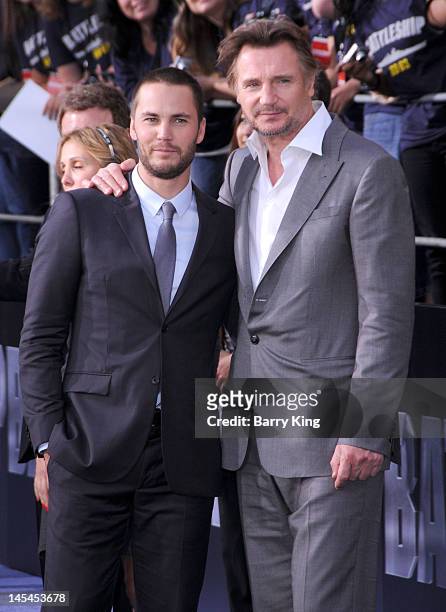 Actor Taylor Kitsch and actor Liam Neeson arrive at the Los Angeles premiere of "Battleship" at the Nokia Theatre L.A. Live on May 10, 2012 in Los...