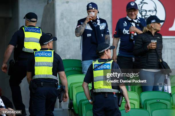 Police officers are seen patrolling the northern end of the stadium during the round 11 A-League Men's match between Melbourne Victory and Brisbane...