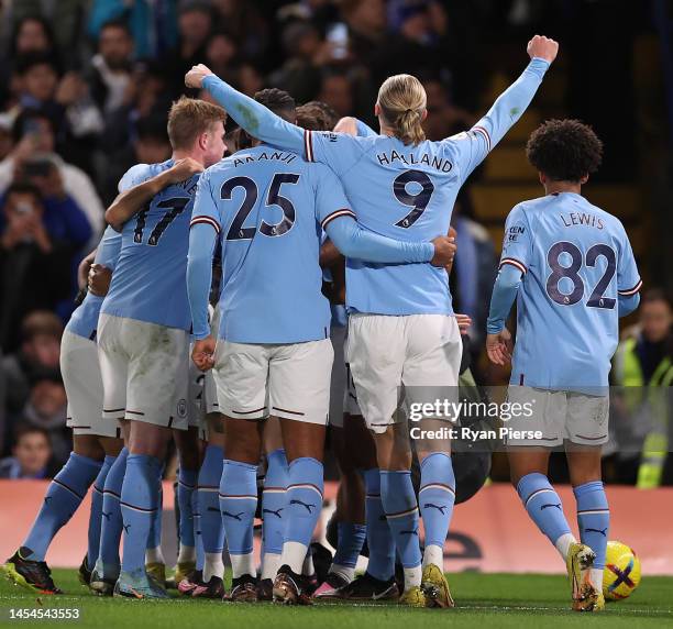 Erling Haaland of Manchester City celebrates their side's first goal during the Premier League match between Chelsea FC and Manchester City at...