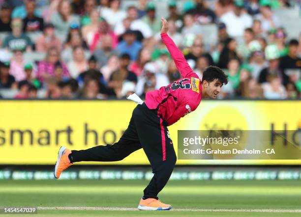 Izharulhaq Naveed of the Sixers bowls during the Men's Big Bash League match between the Melbourne Stars and the Sydney Sixers at Melbourne Cricket...
