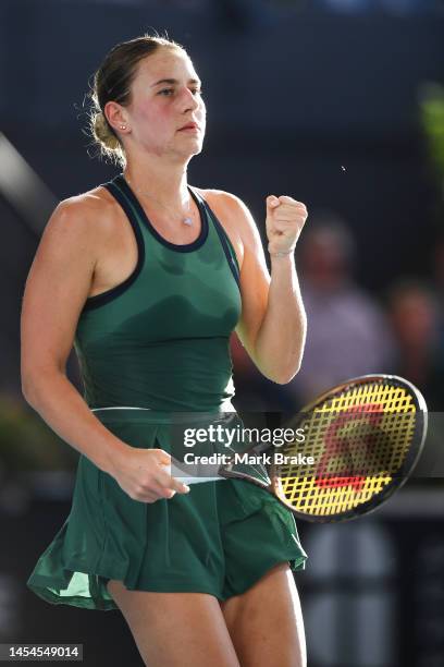 Marta Kostyuk of Ukraine celebrates winning a game against Ons Jabeur of Tunisia during day six of the 2023 Adelaide International at Memorial Drive...