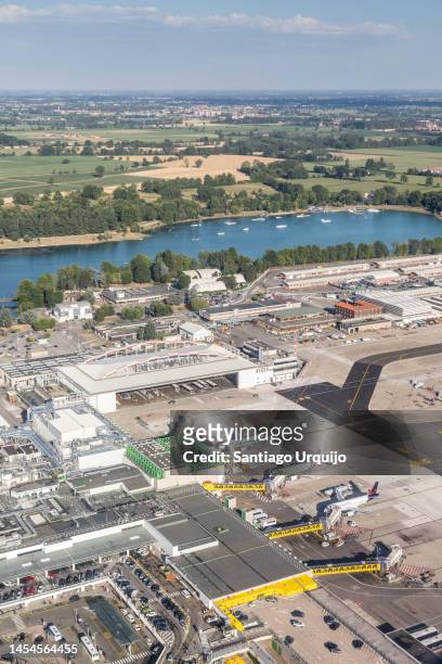 aerial view of milan linate airport - milan airport stock pictures, royalty-free photos & images