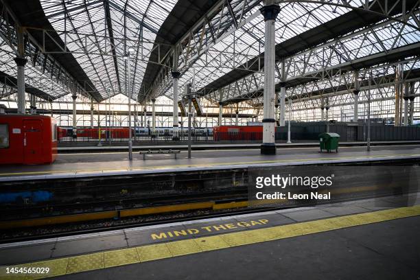Empty platforms are seen at Waterloo station as disruption to services takes effect during the morning rush hour, due to ongoing strike action on...