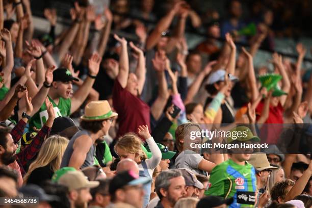 Members of the crowd show their support during the Men's Big Bash League match between the Melbourne Stars and the Sydney Sixers at Melbourne Cricket...