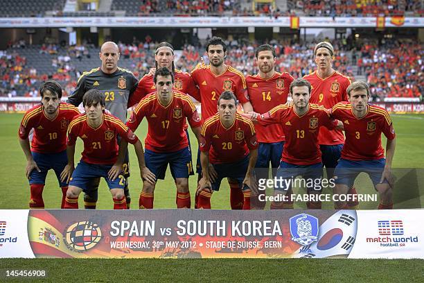Spain's players front row: Benat Etxebarria, David Jimenez Silva, Alvaro Arbeloa, Santiago Cazorla, Juan Manuel Mata and Ignacio Monreal. Second row...