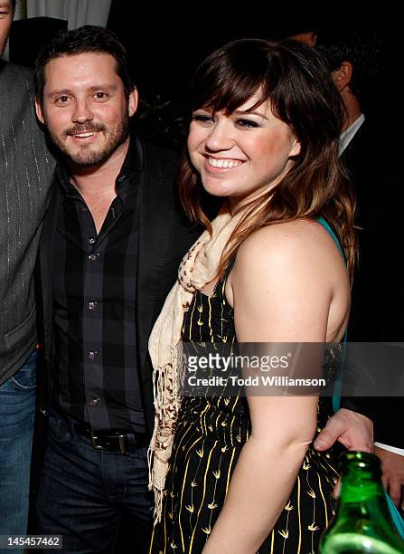 Brandon Blackstock and Kelly Clarkson attend Warner Music Group Grammy Celebration hosted by InStyle at Chateau Marmont on February 12, 2012 in Los...