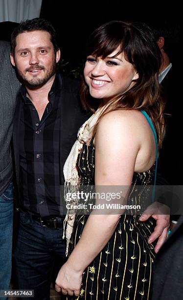 Brandon Blackstock and Kelly Clarkson attend Warner Music Group Grammy Celebration hosted by InStyle at Chateau Marmont on February 12, 2012 in Los...