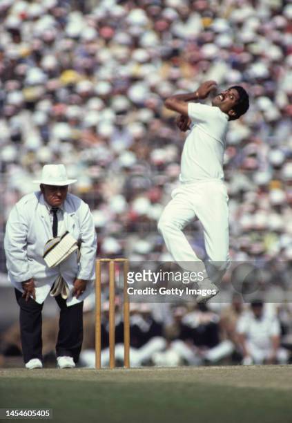India captain Kapil Dev in bowling action during the 1981/82 England tour of India.