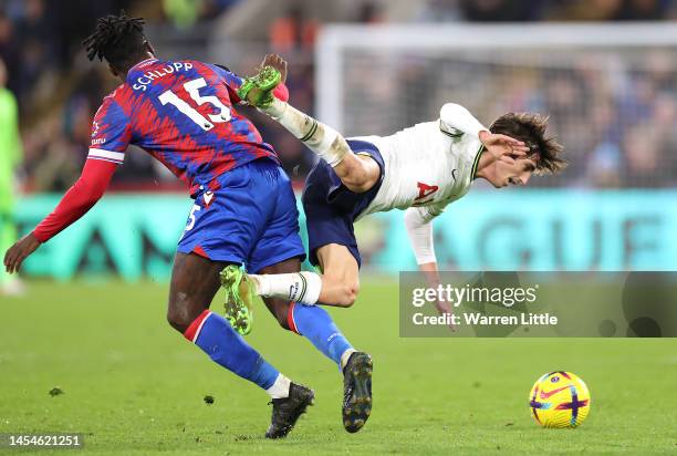 Bryan Gil of Tottenham Hotspur is fouled by Jeffrey Schlupp of Crystal Palace during the Premier League match between Crystal Palace and Tottenham...