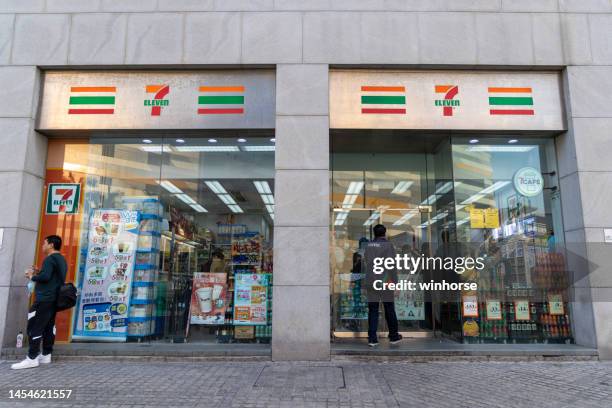7-eleven convenience store in hong kong - lantau stock pictures, royalty-free photos & images