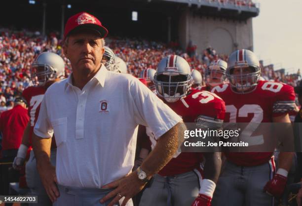 John Cooper, Head Coach for the Ohio State Buckeyes prepares to lead the team onto the field during the NCAA Big Ten Conference college football game...