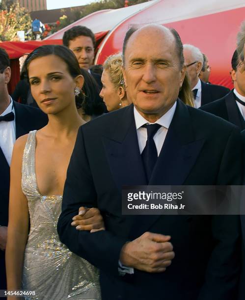 Luciana Pedraza and Robert Duvall arrive at the Academy Awards, March 23, 1998 in Los Angeles, California.