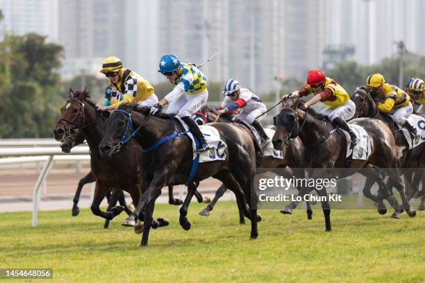 January 1 : Jockey Antoine Hamelin riding Coming Patch wins the Race 6 Willow Handicap at Sha Tin Racecourse on January 1, 2023 in Hong Kong.