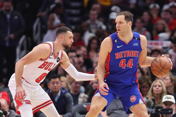Bojan Bogdanovic of the Detroit Pistons drives to the basket against Zach LaVine of the Chicago Bulls during the first half at United Center on...