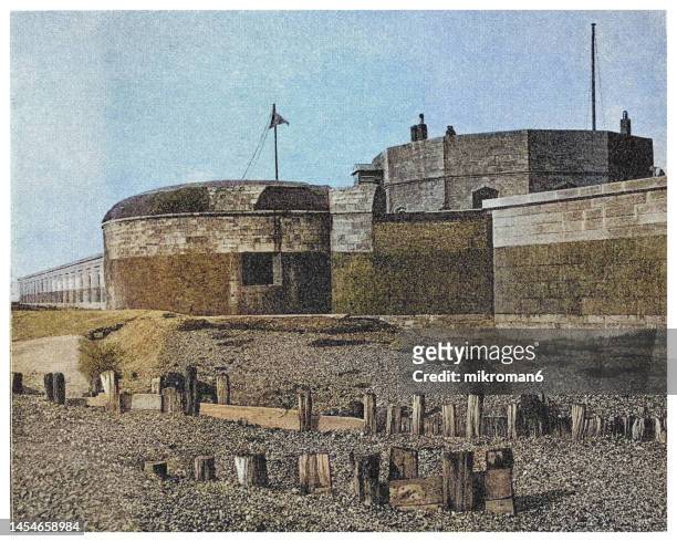 old engraving illustration of hurst castle is an artillery fort established by henry viii on the hurst spit in hampshire, england, between 1541 and 1544 - hearst castle stock pictures, royalty-free photos & images