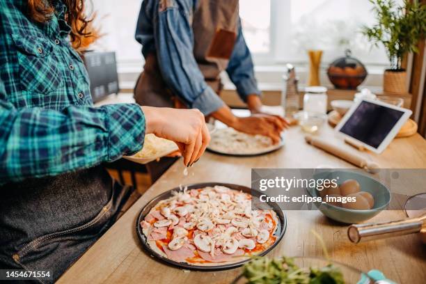 we make the most delicious pizza - pizza with ham stock pictures, royalty-free photos & images