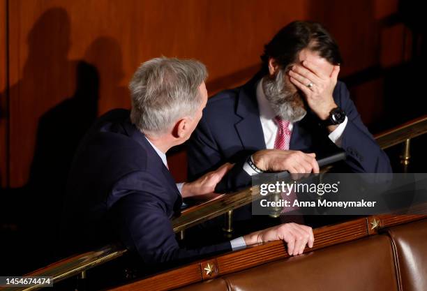 House Republican Leader Kevin McCarthy talks to Rep.-elect Garret Graves in the House Chamber during the fourth day of elections for Speaker of the...