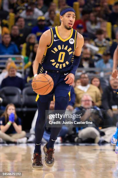 Tyrese Haliburton of the Indiana Pacers brings the ball up the court in the game against the Toronto Raptors at Gainbridge Fieldhouse on January 02,...
