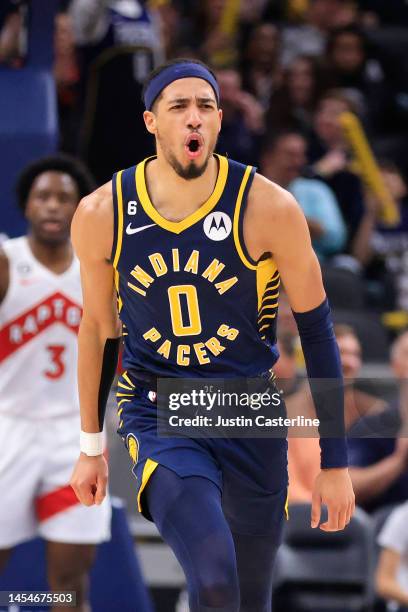 Tyrese Haliburton of the Indiana Pacers reacts after a play in the game against the Toronto Raptors at Gainbridge Fieldhouse on January 02, 2023 in...