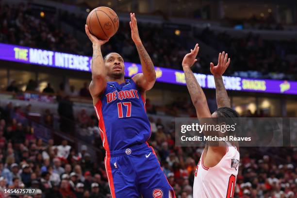 Rodney McGruder of the Detroit Pistons shoots over Coby White of the Chicago Bulls during the second half at United Center on December 30, 2022 in...