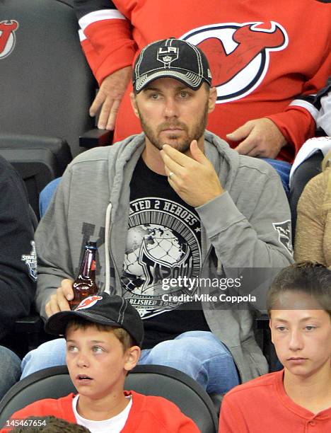 Professional race car driver Kevin Harvick attends the Los Angeles Kings vs the New Jersey Devils game one during the 2012 Stanley Cup final at the...