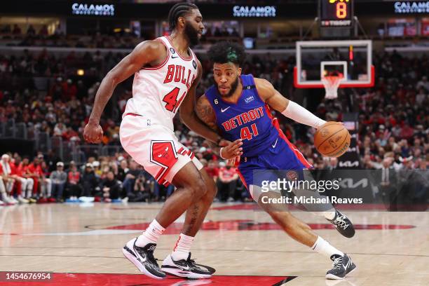 Saddiq Bey of the Detroit Pistons drives to the basket against Patrick Williams of the Chicago Bulls during the second half at United Center on...