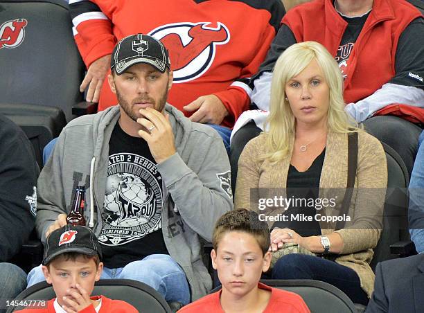 Professional race car driver Kevin Harvick and Delana Harvick attend the Los Angeles Kings vs the New Jersey Devils game one during the 2012 Stanley...