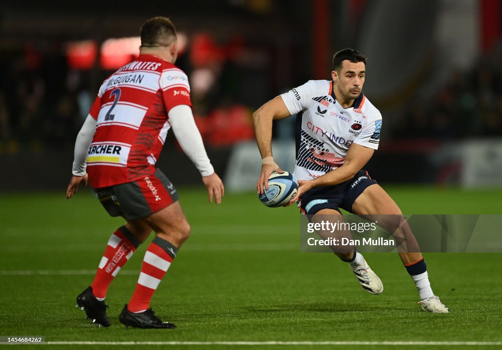 George Ross Rugby Alex Lozowski of Saracens takes on George McGuigan of Gloucester ...