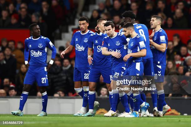 Conor Coady of Everton celebrates with teammates after scoring the team's first goal during the Emirates FA Cup Third Round match between Manchester...