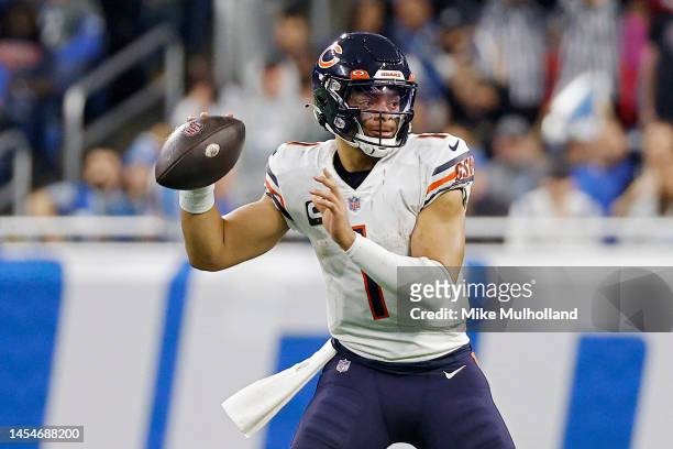 Justin Fields of the Chicago Bears throws a pass in the second half of a game against the Detroit Lions at Ford Field on January 01, 2023 in Detroit,...